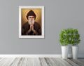 Obraz religijny na płótnie Święty Charbel - rama biała