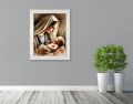 Obraz religijny na płótnie Matka Boża z Dzieciątkiem Jezus - biała rama