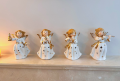 Figurka porcelanowa z Aniołem Stróżem - 4 szt.